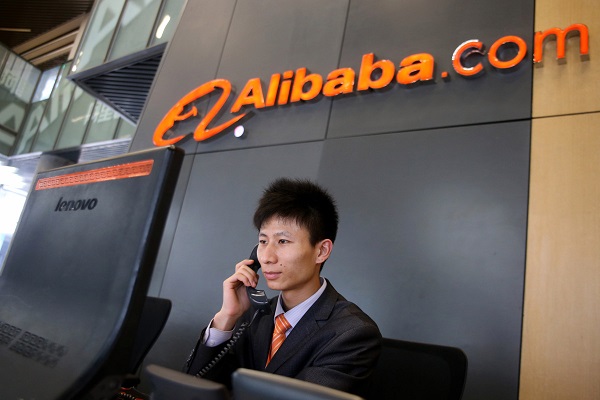 HANGZHOU, CHINA - MARCH 29: Employee works at the Alibaba Group headquarters on March 29, 2014 in Hangzhou, China. Chinese e-commerce giant Alibaba has decided to begin its initial public offering (IPO) process in the United States, the company announced recently. Alibaba Group Holding Ltd began in 1999 with the web site Alibaba.com. It's a privately owned China's Hangzhou-based group of Internet-based e-commerce businesses including business-to-business online web portals, online retail and payment services, a shopping search engine and data-centric cloud computing services. (Photo by Hong Wu/Getty Images)